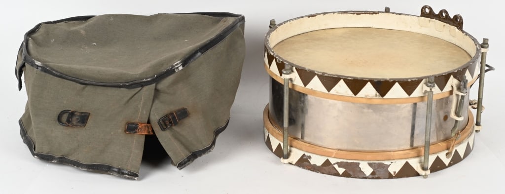 WWII NAZI GERMAN HITLER YOUTH HJ MARCHING DRUM: A 38cm diameter drum with skins to either face separated by a 16.5cm tall brass surround with upper and lower wooden bands. The thigh brace is riveted to the lower band beneath where the drum hanger w