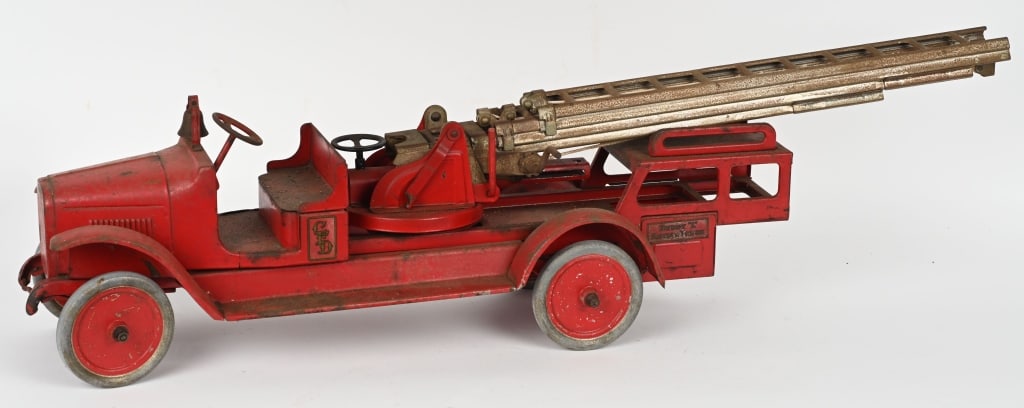 BUDDY L PRESSED STEEL AERIAL LADDER TRUCK: All original pressed steel truck. Has decent paint and decals. Should clean to higher grade. 36" Very Good