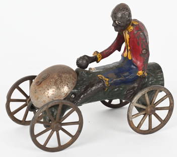 N.N. HILL CAST IRON MONKEY AND COCONUT BELL TOY: Cast iron bell toy circa 1900 made by N.N. Hill Brass co. All original with no cracks or repairs. Missing bell clinger. 6" Very Good-Excellent