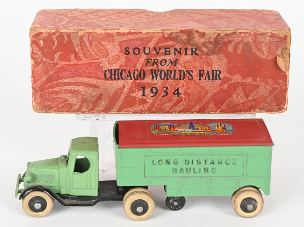 TOOTSIETOY 1934 CHICAGO WORLDS FAIR TRUCK w/ BOX: Scarce Tootsietoy 1934 Chicago Worlds Fair Mack Semi Truck. Has great Worlds Fair decal on top of the truck. Comes in original Worlds Fair Souvenir Box. 6" Excellent