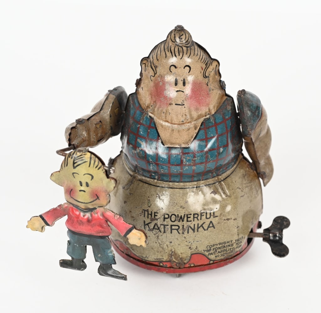 NIFTY TIN WINDUP POWERFUL KATRINKA & JIMMY (1 of 4)