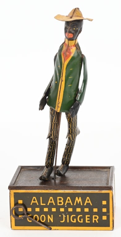 STRAUSS WINDUP TOMBO ALABAMA COON JIGGER: Nice original Coon Jigger. Toys in great shape with nice colors. All original. Windup works. 10" Excellent