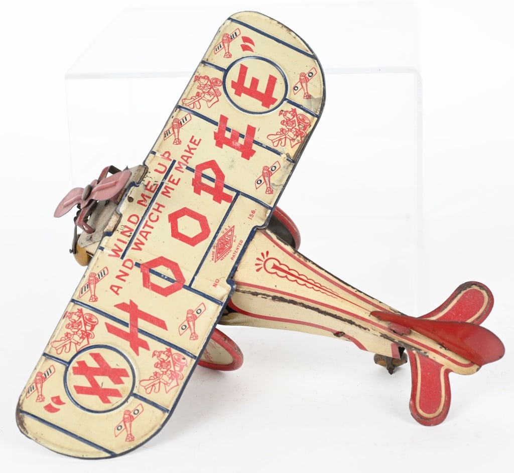 NONPAREIL WINDUP WHOOPEE AIRPLANE (1 of 5)