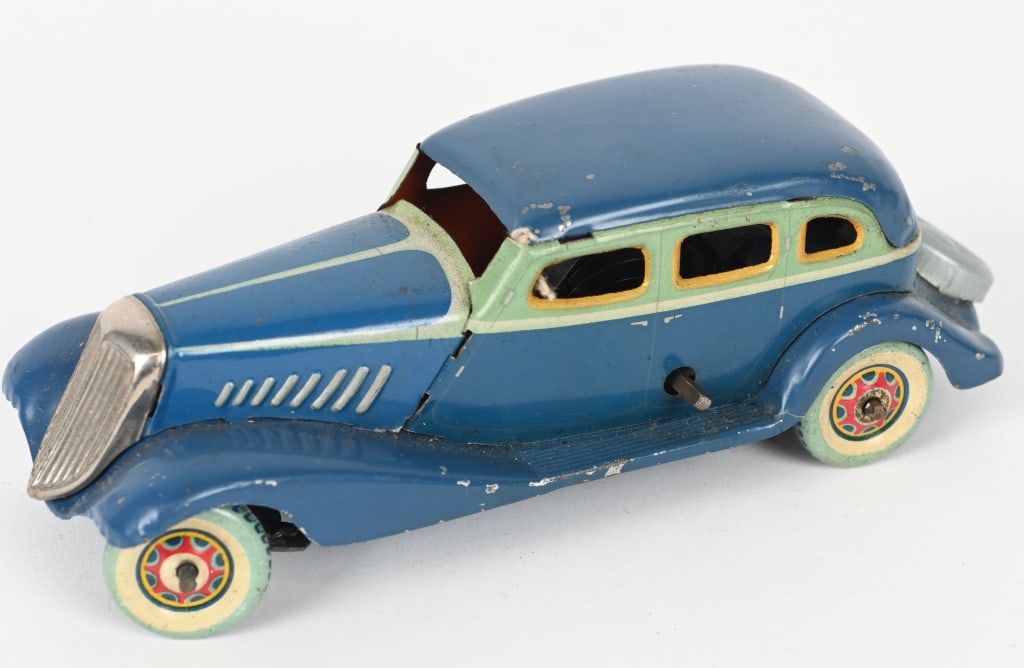 6" PREWAR JAPAN TIN WINDUP GRAHAM PAIGE: All original in great shape. Windup works. 6" Excellent