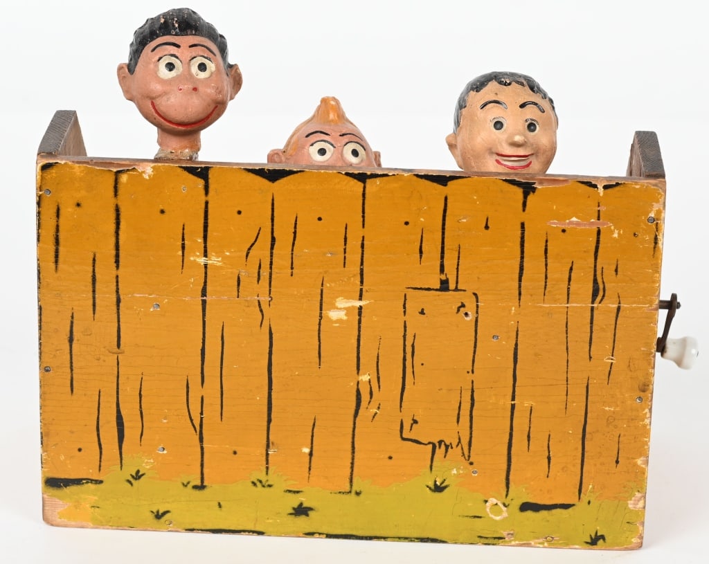 MUSICAL BOYS LOOKING OVER FENCE (1 of 6)