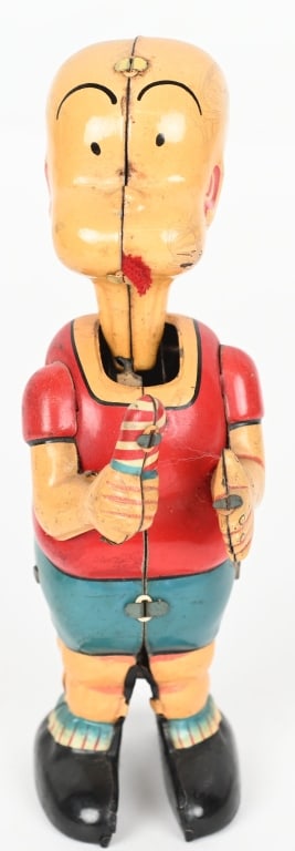 LINEMAR WINDUP HENRY WITH CANDY: All original with nice colors. Windup works. 6" Excellent