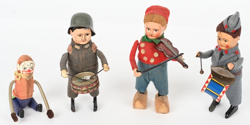 SCHUCO SOLDIERS, DUTCH BOY, & CLOWN (1 of 7)