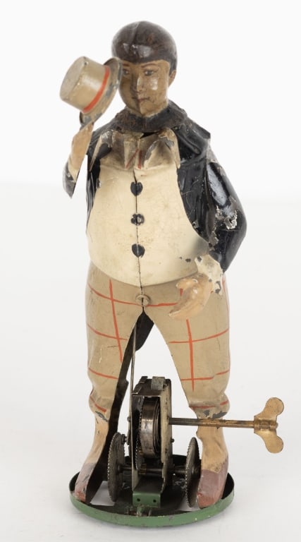 GERMAN HAND PAINTED WINDUP MAN TIPPING HAT (1 of 4)