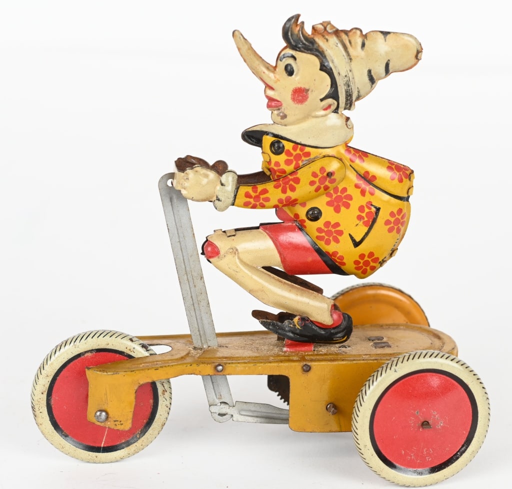 INGAP TIN WINDUP PINOCCHIO SCOOTER (1 of 4)