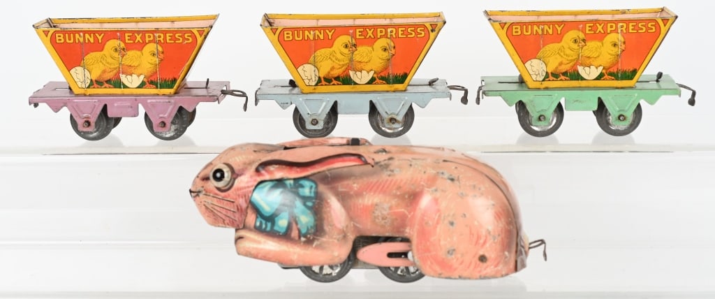 MARX CLOCKWORK BUNNY EXPRESS TRAIN SET: Marx clock work Bubby Express Train Set. Includes Bunny Engine with 3 Cars with Chick graphics. All original in nice condition. Windup works. Comes with track. Bunny measures 8" Excellent