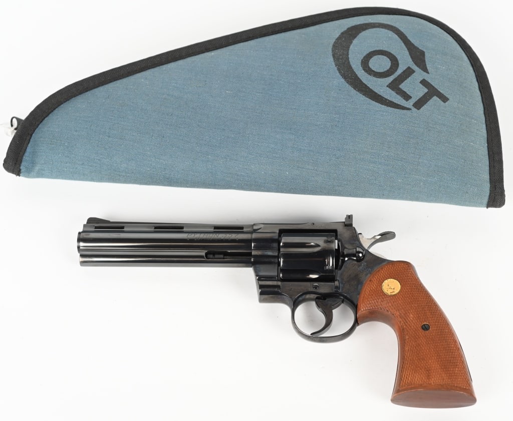 FINE CONDITION EARLY COLT PYTHON REVOLVER 1959: SERIAL NUMBER: 8919. BARREL: 6". CALIBER: .357 MAGNUM. MANUFACTURED: 1959. Early four digit gun, standard markings and features. Matching serials. Vent rib barrel, with factory blade front sight and a
