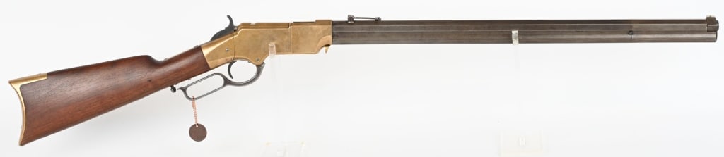 LATE MODEL HENRY RIFLE: Serial number 11607, manufactured 1865. 24-1/4 inch barrel. Chambered in .44 Henry Rimfire. Barrel marked " HENRY'S PATENT OCT.16 1860 / MANUFACT'D BY THE NEW HAVEN ARMS CO. NEW HAVEN CT." Sling provi