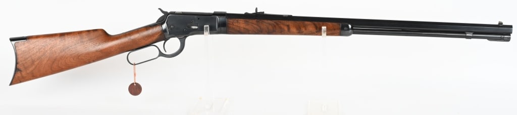 WINCHESTER MODEL 1892 TAKE-DOWN RIFLE: SERIAL NUMBER:164363 BARREL: 24-1/4 inch octagon with full length magazine tube. CALIBER: .25-20 WCF cartridge. MANUFACTURED: 1897. Plain walnut stock and forearm. Rifle style crescent butt plate. Fin