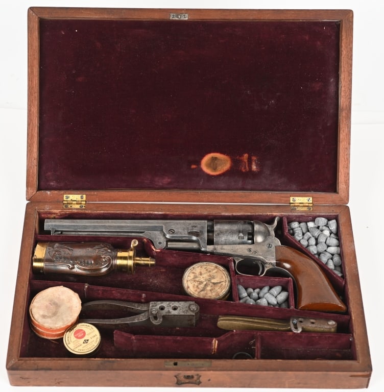 CASED COLT'S 1851 NAVY REVOLVER WITH ACCESORIES: SERIAL NUMBER 10595 BARREL 7 1/2" CALIBER .36 PERCUSSION MANUFACTURED 1852. All matching serial numbers including the wedge. Standard features include octagon barrel, round silver plated trigger guard