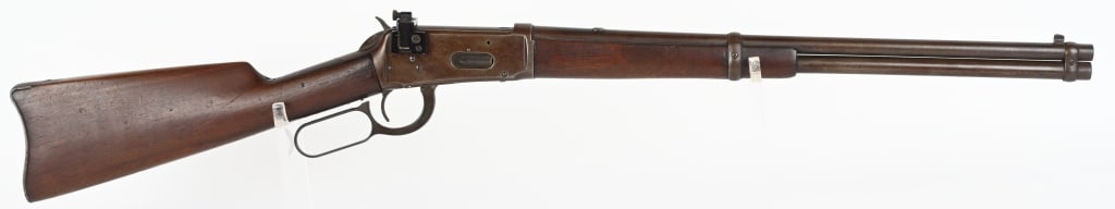 WINCHESTER MODEL 1894 CARBINE: SERIAL NUMBER: 132707 BARREL: 20-inch round CALIBER: .32-40 cartridge. MANUFACTURED:1897. Plain walnut forearm and butt stock. Blue steel carbine style butttplate. Square block with small blade front 