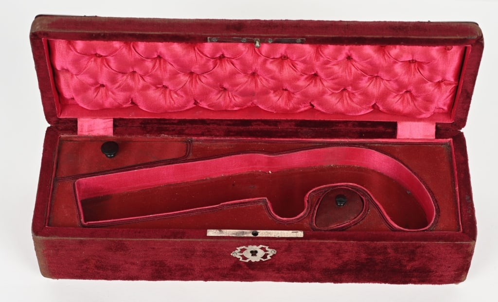 PEPPERBOX PISTOL, ORNATE SILK LINED CASE: Very nice case for a pepperbox pistol. The case is cloth covered with silver plated pierced metal adornments. The inside of the case is silk lined and is fitted in the French style for a pepperbox pis