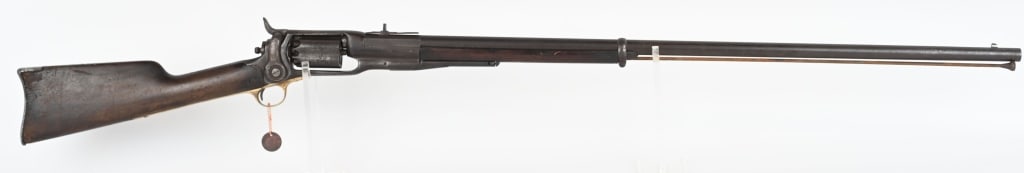 COLT MODEL 1855 REVOLVING RIFLED MUSKET: SERIAL NUMBER 8157. BARREL 37 1/2" CALIBER .56. These five shot revolving rifles were known to have been used in the Seminole war and later by the Berdan Sharp Shooters during the Civil War. Stamped,