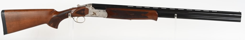 STEVENS MODEL 512 OVER / UNDER SHOTGUN 12 GA.: SERIAL NUMBER: U07A2893 BARREL: 28" CALIBER: 12 GA. 2 3/4" - 3" SHELLS. MANUFACTURED: 2000's Receiver is mat Stainless Steel and Blued barrels with Brass Front and Rear Beads. Wood is Grade 1 Walnut w
