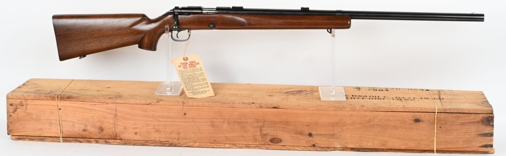 VERY FINE WINCHESTER MODEL 52C TARGET WITH CRATE: SERIAL NUMBER: 78337C. BARREL: 28". CALIBER: .22LR. MANUFACTURED: 1953. Model 52C target with factory adjustable trigger and heavy barrel. Original scope blocks and holes drilled on the receiver for r
