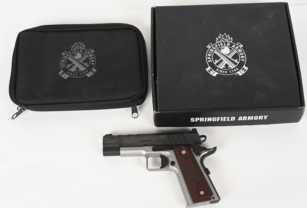 SPRINGFIELD ARMORY 1911 EMISSARY .45 ACP WITH BOX: SERIAL NUMBER: NM752756. BARREL: 4-1/2". CALIBER: .45 ACP. MANUFACTURED: 2010S. Factory green dot front night sight and u-notch rear. Original blued slide and matte stainless frame, with coarse textur