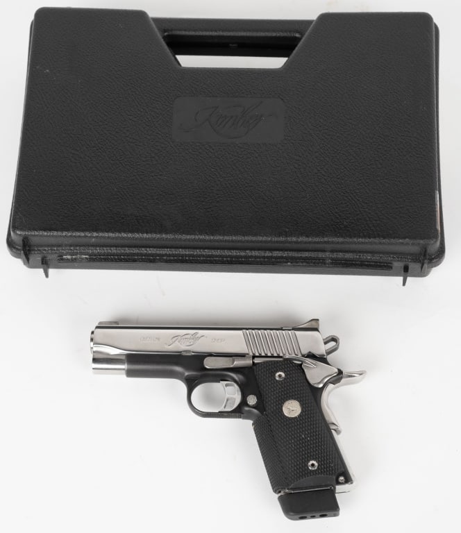 KIMBER CUSTOM SHOP COMPACT CDP II .45 ACP: SERIAL NUMBER: KC21379. BARREL: 4". CALIBER: .45 ACP. MANUFACTURED: 2010S. Factory 3-dot tritium night sights. Black anodized frame, with polished slide/small parts. Skeleton trigger. Checkered rubber