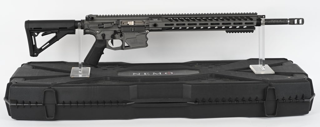 NEMO ARMS EXECUTIVE ORDER .260 REM RIFLE: SERIAL NUMBER: XOYP00308. BARREL: 20-1/2". CALIBER: .260 REM. MANUFACTURED: 2017. Carbon fiber barrel with ported muzzle break. Low profile, adjustable gas system with flat top upper and rail system.