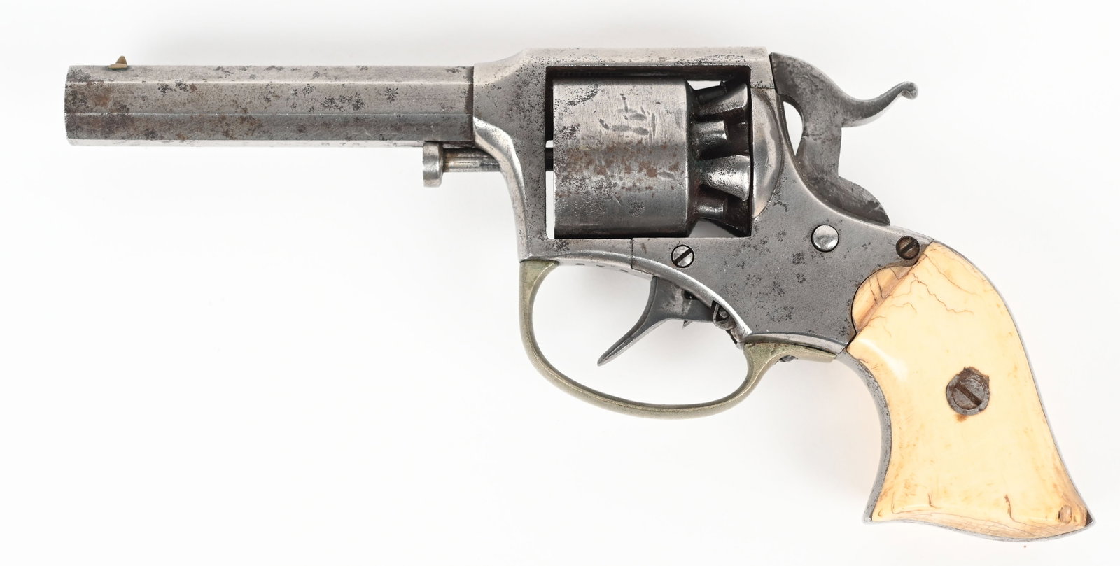 REMINGTON RIDER PERCUSSION POCKET REVOLVER: SERIAL 873 BARREL 3". CALIBER 31 PERCUSSION. MFG1860-1873. Five shot double action, octagon barrel, with ivory grips. CONDITION: Very good with rare, original ivory grip. Mostly smooth metal with good