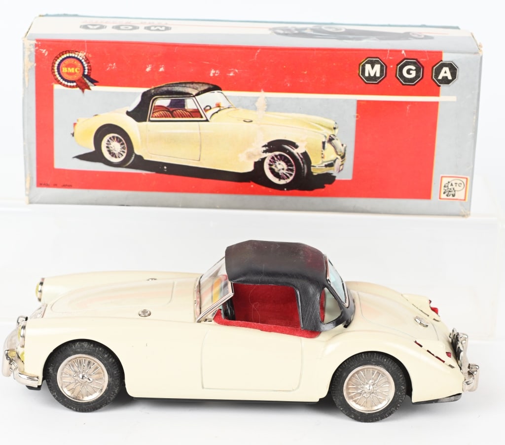 ATC TIN FRICTION MGA w/ BOX: All original and looks never played with. Has removable top. Friction works. Boxed. 8" Excellent
