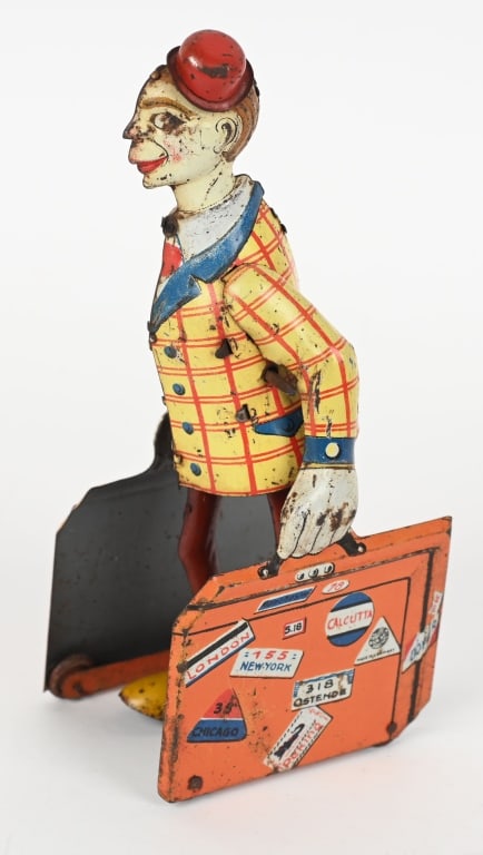 DISTLER TIN WINDUP TRAVELING CLOWN (1 of 4)