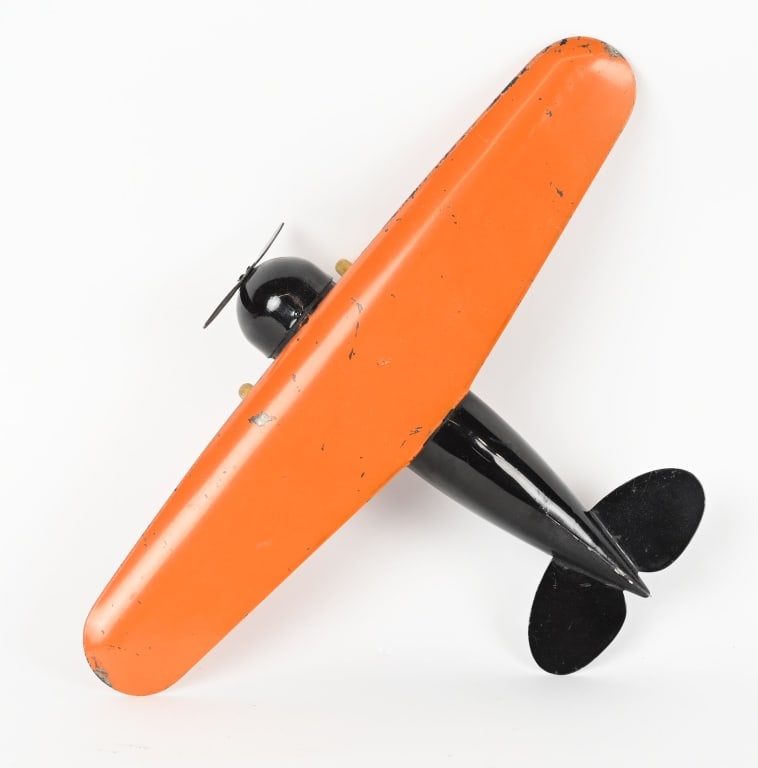 WYANDOTTE PRESSED STEEL MONOPLANE 18" WS: Nice all original Wyandotte pressed steel monoplane. Nice colors with gloss. Wing span is 18" by 12". Excellent