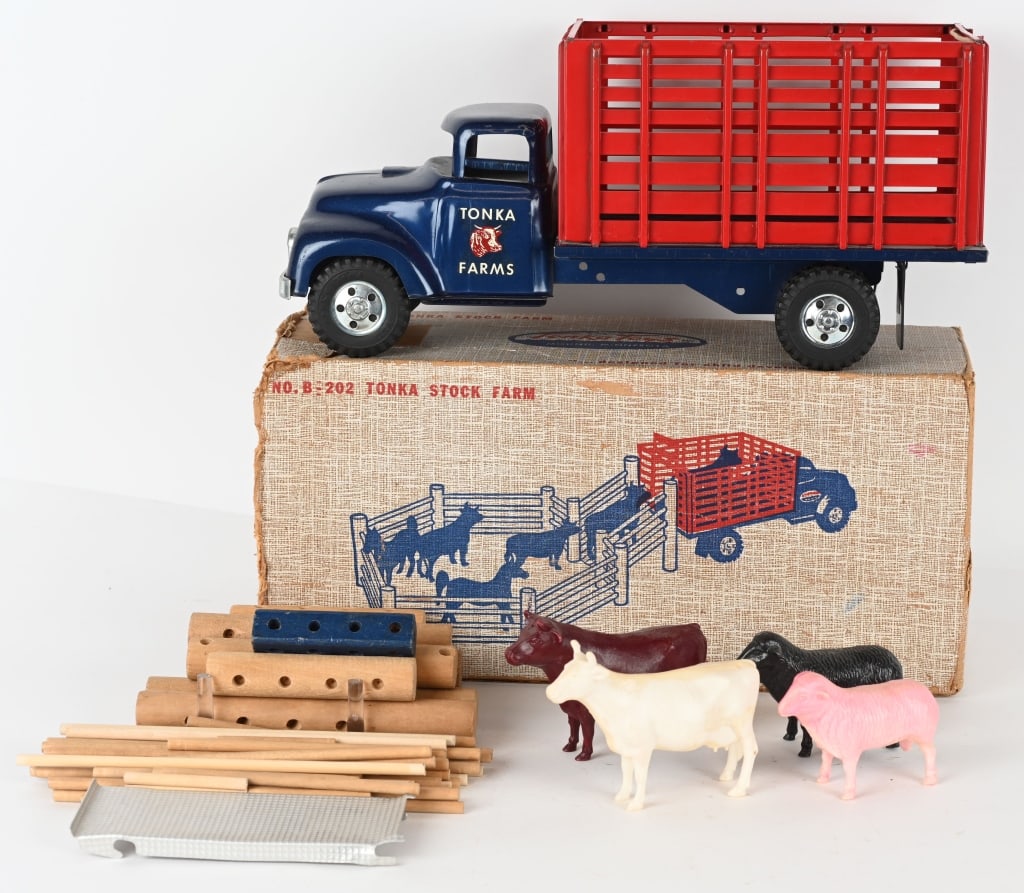 TONKA #B 202 STOCK FARM w/ BOX: All original Stake Bed Truck that looks never played with. Comes with Animals and Fence. Boxed missing 1 side end flaps. Excellent