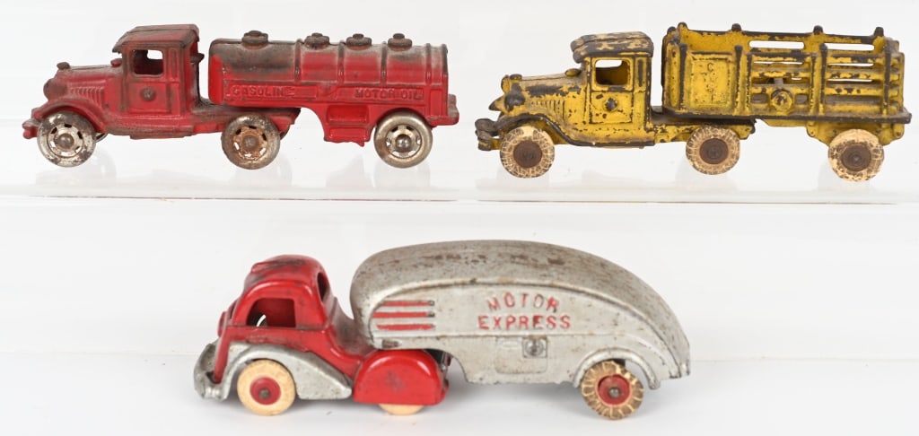3- CAST IRON SEMI TRUCKS (1 of 4)