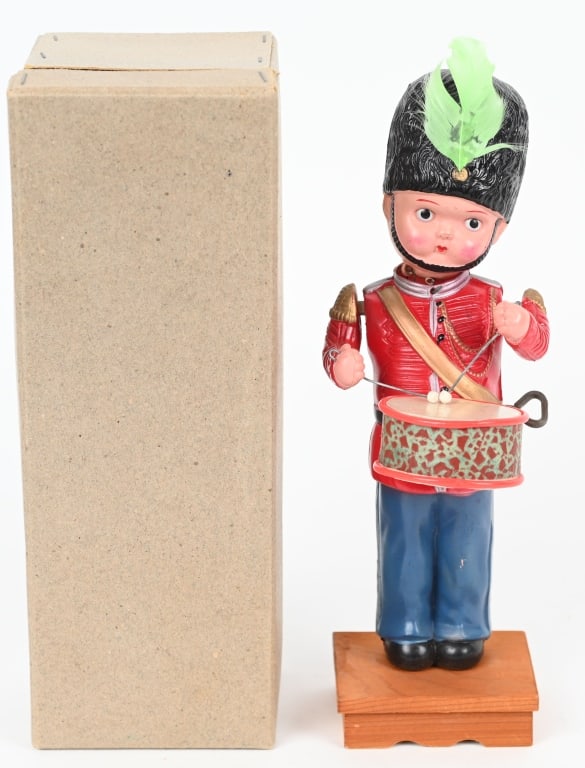 PREWAR JAPAN CELLULOID WINDUP DRUMMING SOLDIER: All original with great colors. Looks never played with condition. Windup works. Boxed 10" Excellent