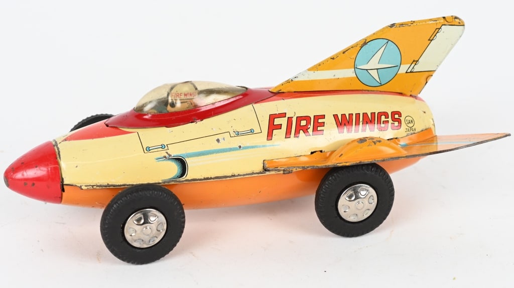 JAPAN TIN FRICTION FIRE WINGS SPACE ROCKET CAR (1 of 5)
