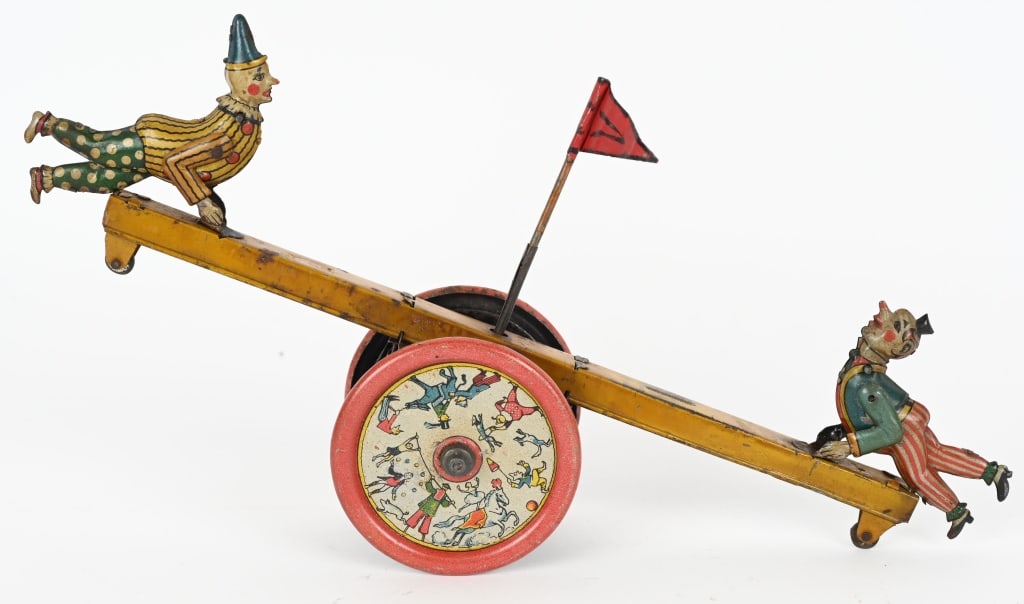 DISTLER TIN WINDUP CLOWN SEE SAW (1 of 4)