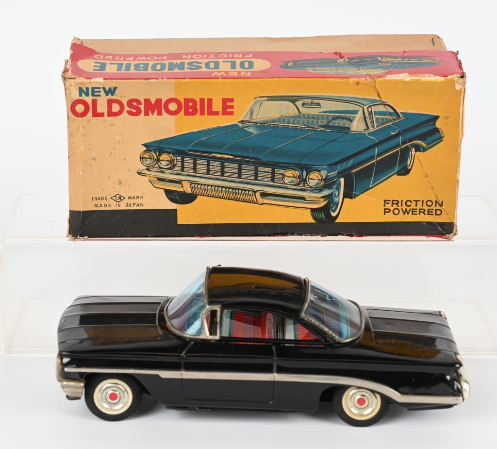 JAPAN TIN FRICTION NEW OLDSMOBILE w/ BOX: All original and in great condition. Friction works. Boxed 9" Excellent