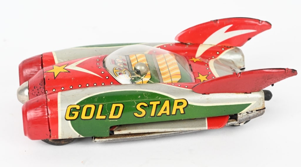 JAPAN TIN FRICTION GOLD STAR SPACE SHIP (1 of 7)