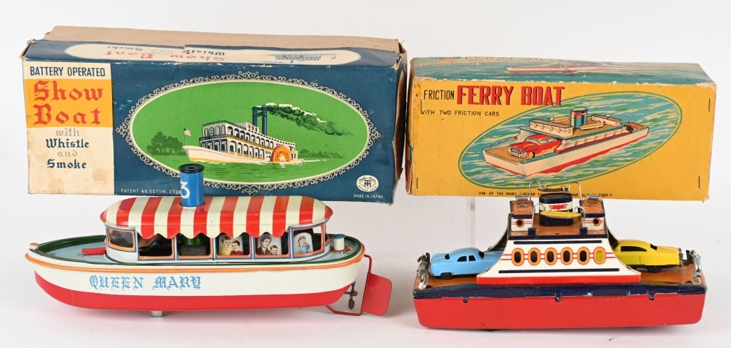 2- JAPAN BATTERY OP BOATS: Includes Ferry Boat all original with Cars. Did not work. Boxed. Plus Queen Mary River Boat all original and did not work. Comes with Show Boat Box. Excellent