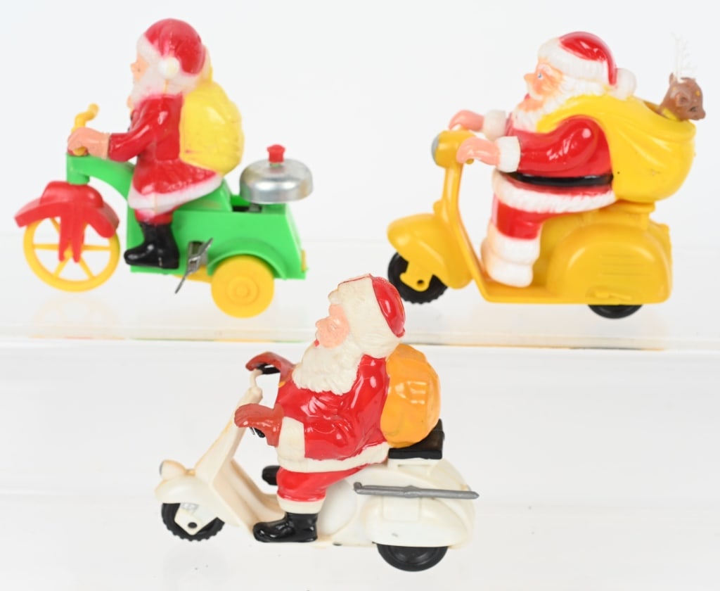 3- PLASTIC SANTA CLAUS SCOOTERS (1 of 4)