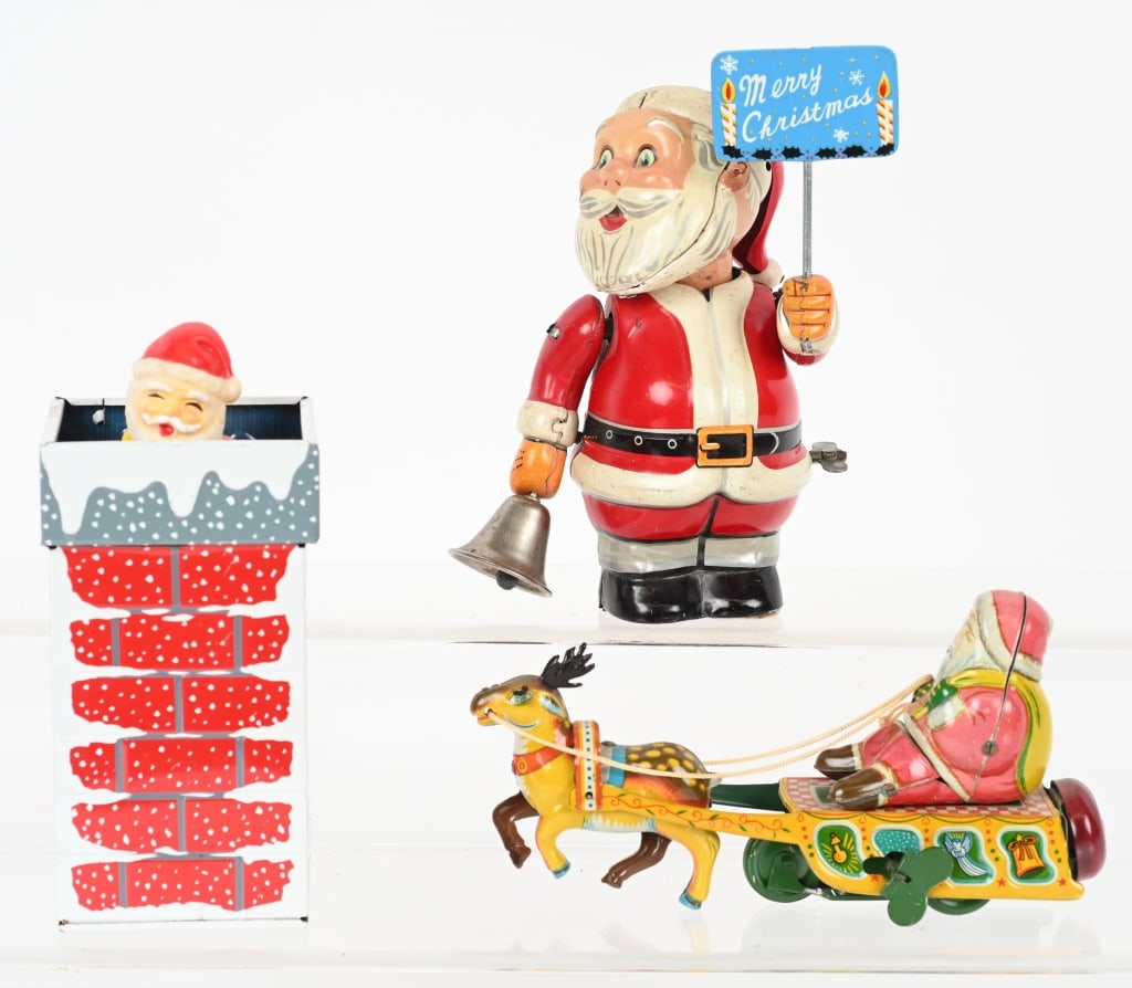3- TIN WINDUP SANTA CLAUS TOYS (1 of 4)