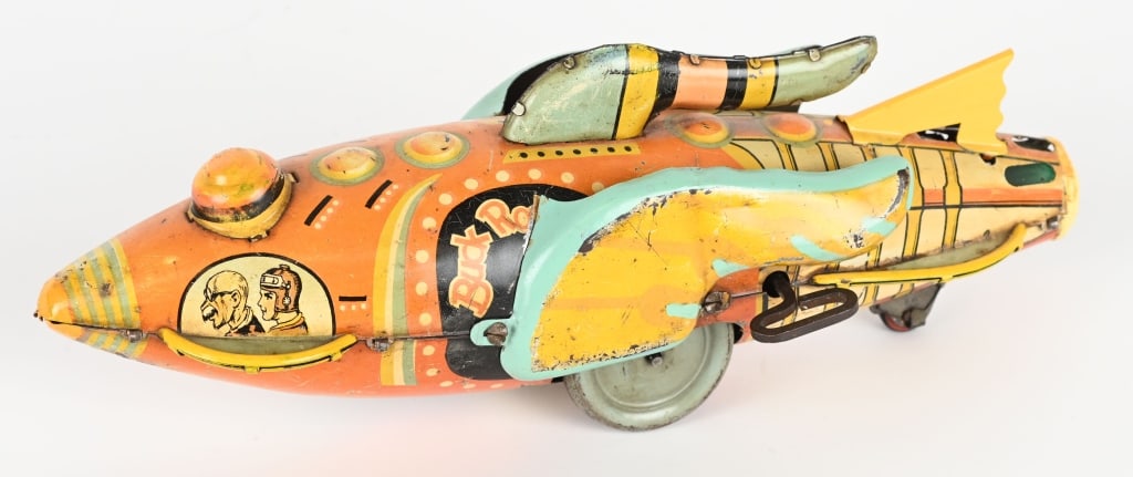 MARX TIN WINDUP BUCK ROGERS ROCKETSHIP: Desirable Marx toy. Has some wear and replaced tail fin. Windup works. 12" Very Good