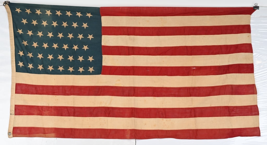 46 STAR UNITED STATES AMERICAN FLAG LOT 1908: lot of American Flags to include 1) 46 Star American Flag measuring 3 X 5 Feet with a printed Canton and sewn Stripes. Oklahoma, the 46th state, entered the Union on November 16, 1907. As such, t