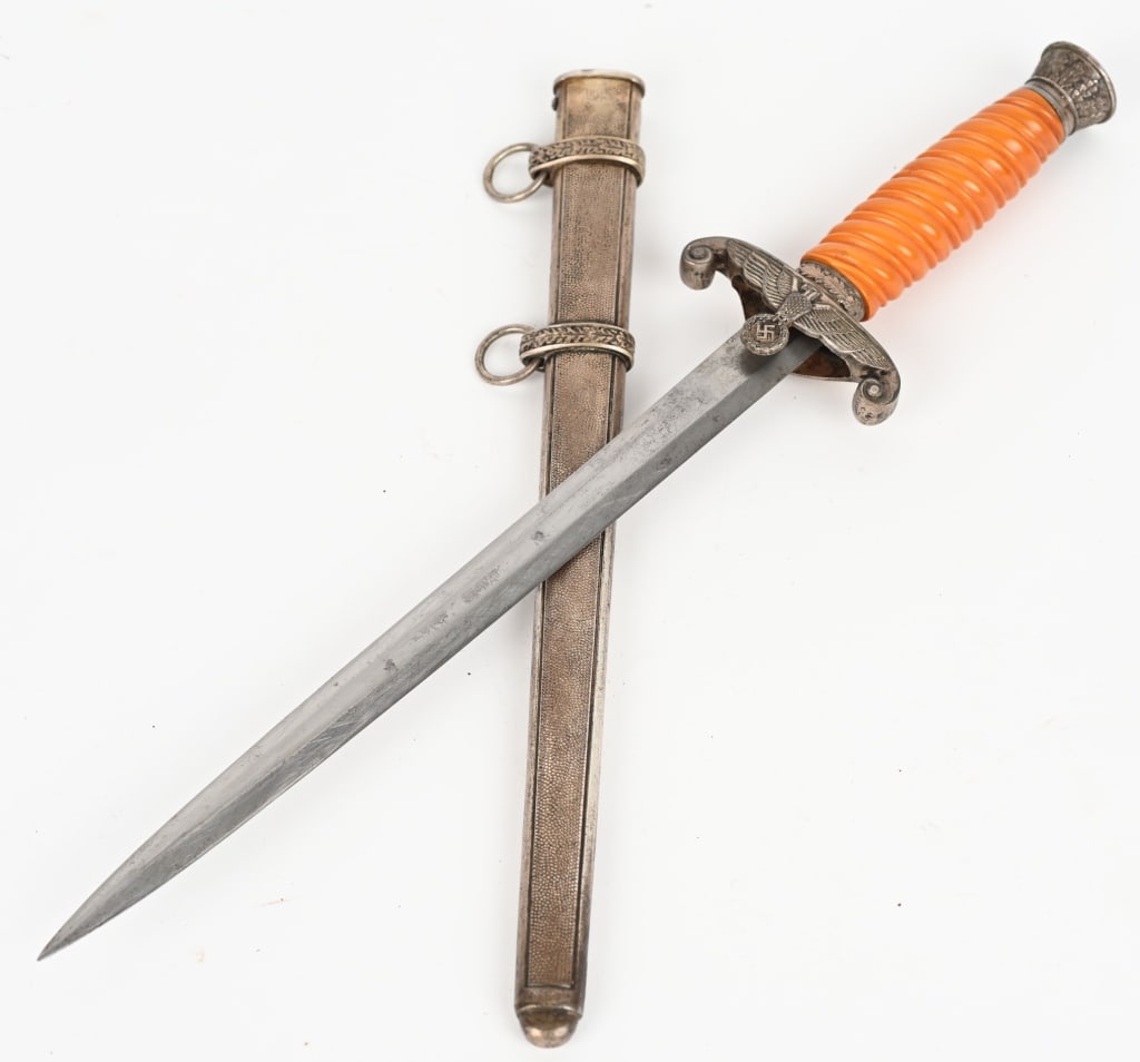 WWII NAZI GERMAN WEHRMACHT ARMY OFFICERS DAGGER: The dagger features a roughly, 10 1/4", (26 cm), long, drop forged, steel construction, nickel/silver plated, stiletto style blade with a flat central ridge and a full length, including the hilt, of r