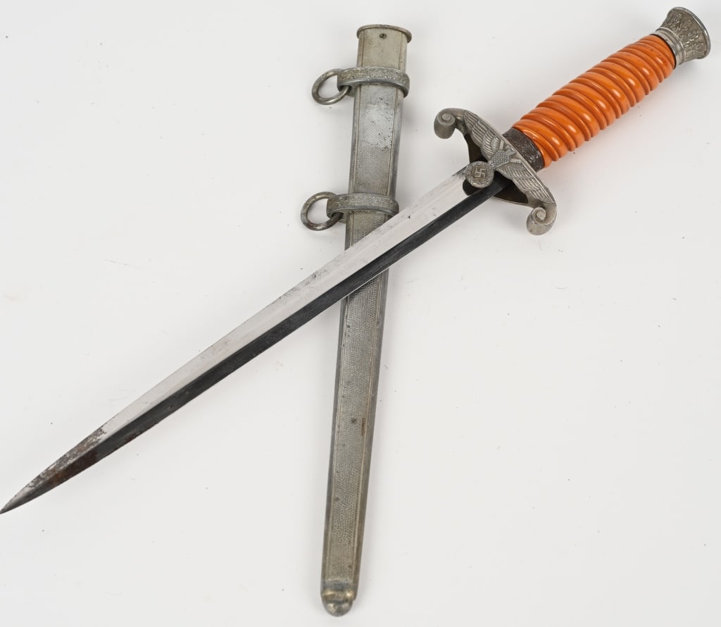 WWII NAZI GERMAN WEHRMACHT ARMY OFFICERS DAGGER: The dagger features a roughly 26cm long drop forged steel construction nickel/silver plated stiletto style blade with a flat central ridge and a full length including the hilt of roughly 38cm. Nice cl