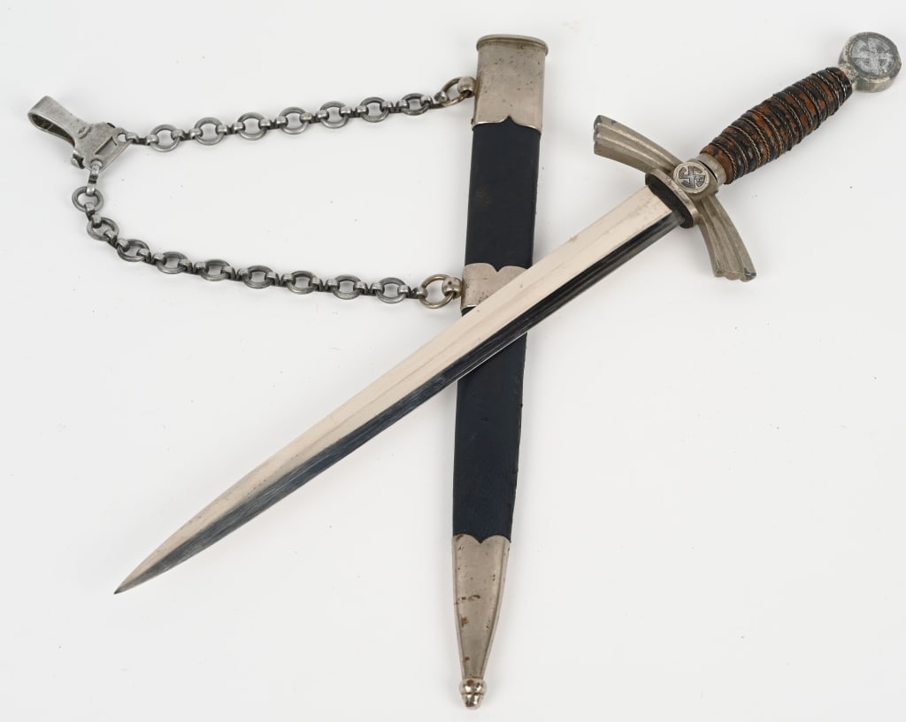 WWII NAZI GERMAN LUFTWAFFE FIRST PATTERN DAGGER: Early (circa 1936-1937) roughly 30.5cm long bright nickel/silver plated drop forged steel double edged stiletto style blade with a flat central plane. The reverse ricasso is well marked with aci