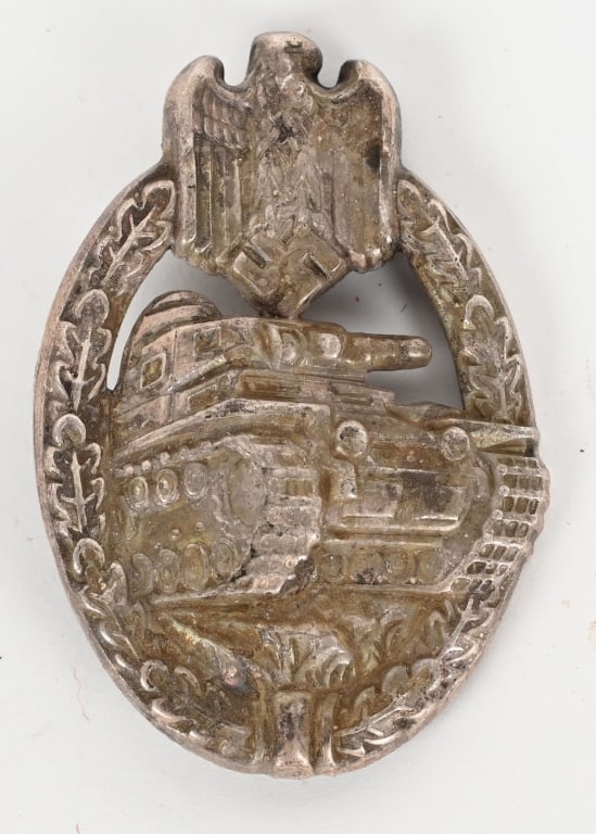 WWII NAZI GERMAN PANZER ASSAULT BADGE SILVER WW2: Nicely detailed, die stamped, hollow backed, alloy construction award with a nickle/silver plate. The badge is in the form of an embossed, vertically oval, oak-leaf wreath with a Wehrmacht style eagle