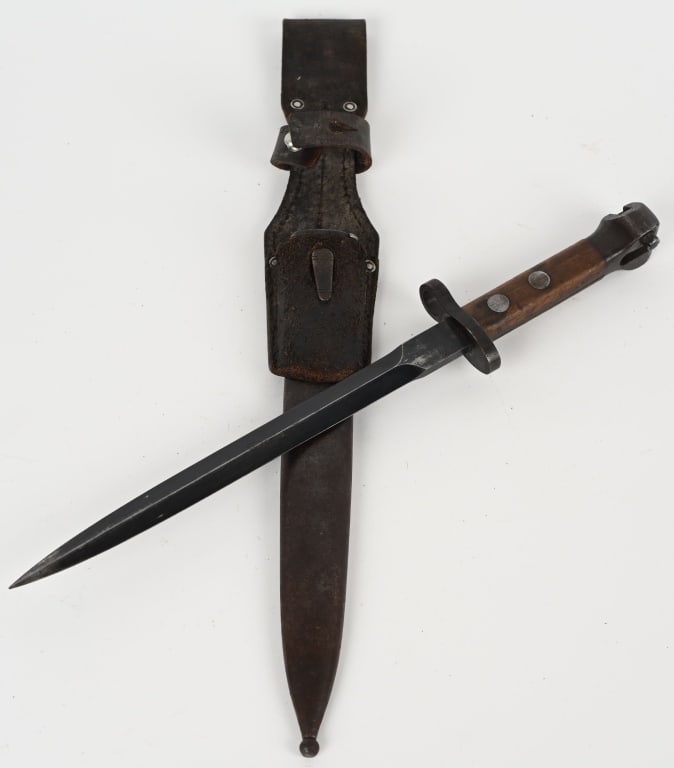 M1895 DUTCH BAYONET & SCABBARD W FROG: Dutch rifle bayonet marked "HEMBURG" at the ricasso. Comes in steel scabbard with a 14" blade, 18.8" overall length. Comes with a Nazi German Leather Frog. Excellent.