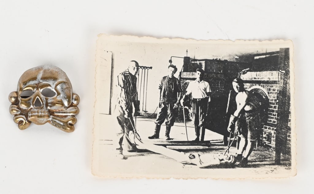 EARLY ALLGEMEINE SS KEPI VISOR CAP DANZIGER SKULL: First pattern, (Circa 1923-1934), silver washed, stamped alloy construction Imperial Prussian Danziger style skull, with no bottom jaw, superimposed over crossed bones. The skull features two rows of