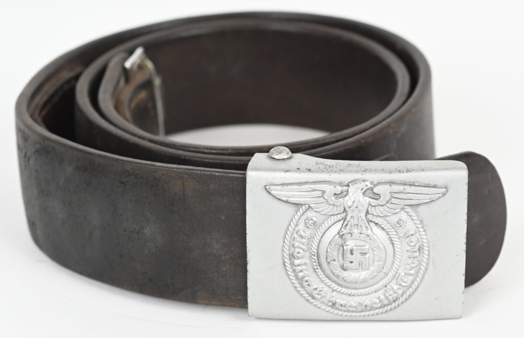 WWII NAZI GERMAN WAFFEN SS 36/40 BELT BUCKLE WW2: An SS EM/NCO'S Buckle by RZM 36/40 SS - Aluminum construction buckle (injection molded), plain, with embossed central section featuring SS pattern eagle and swastika, surrounded by SS motto "Meine Ehr