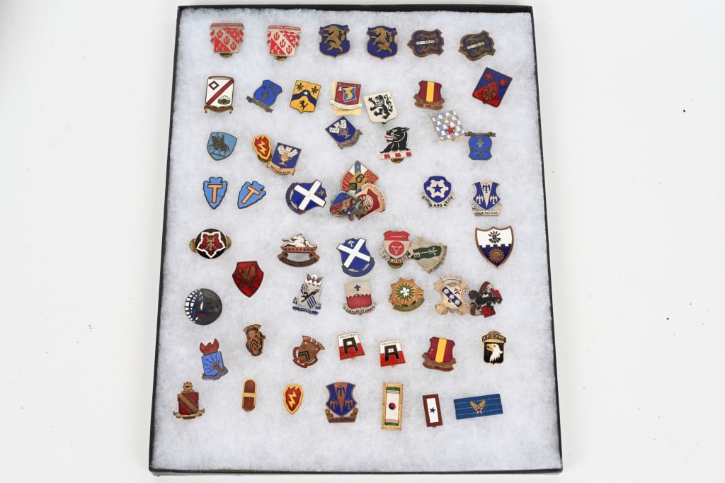 WWII US ARMY DISTINCTIVE UNIT INSIGNIA LOT OF 55: Distinctive Unit Insignia lot of 55. All are excellent mostly with fine enamel. 